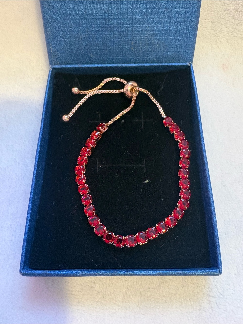 Bolo Bracelet In Gold Tone With Ruby Glass Beads